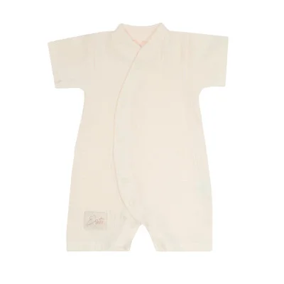 Letní overal pro miminko mušelín Cream od českého výrobce dětského oblečení Esito.