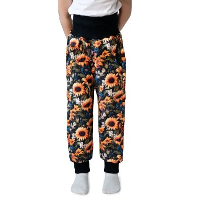 Rostoucí softshellové kalhoty Slunečnice od českého výrobce oblečení Esito.