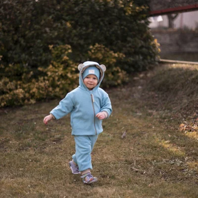 Dětská bunda Warmkeeper Teal ilustrační foto náhled na celý komplet od českého výrobce módy pro děti a dospělé Esito.